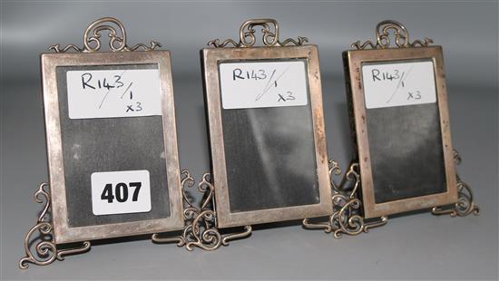 A set of three George V silver photograph frames,